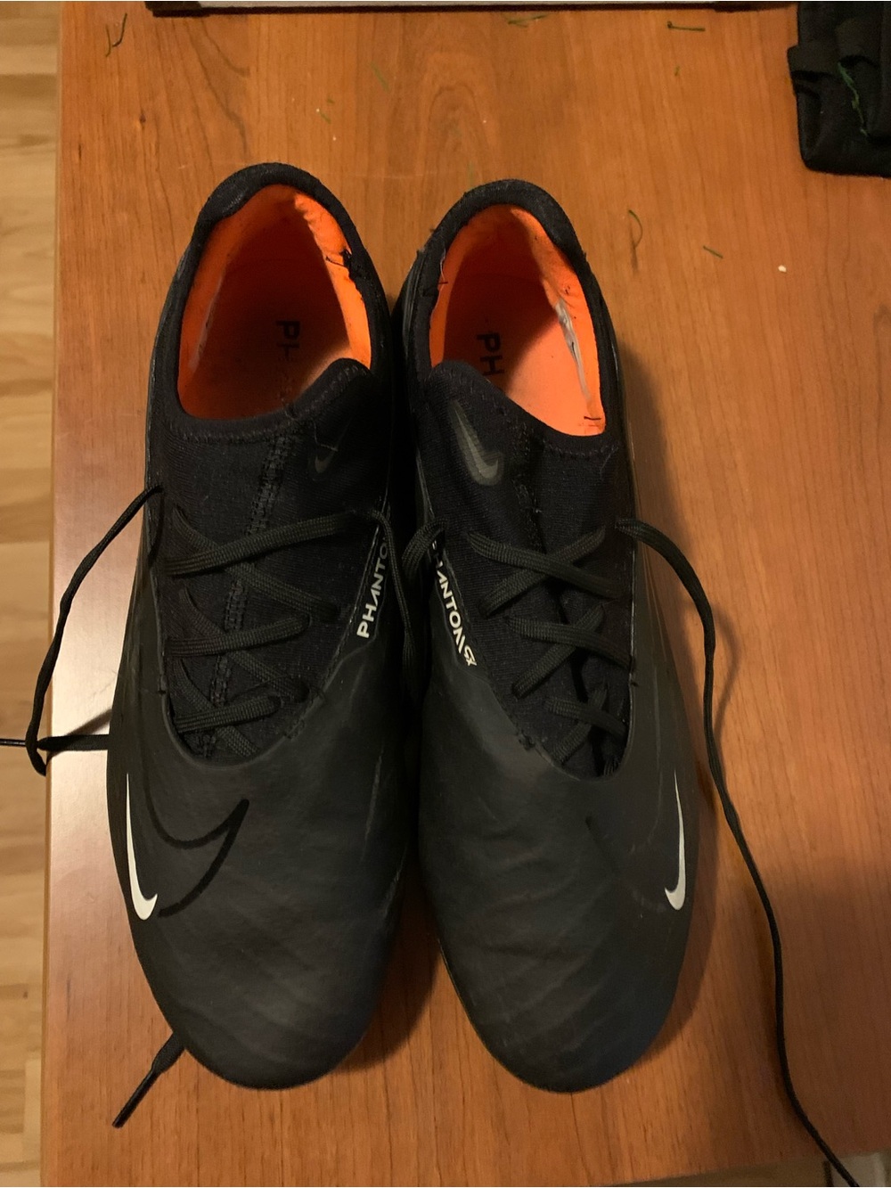 Nike Men’s Black Soccer Cleats with Orange Interior